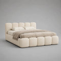 Letto matrimoniale 160x200 cm struttura imbottita tessuto bouclé beige con testiera e pediera a blocchi arrotondati rete a doghe